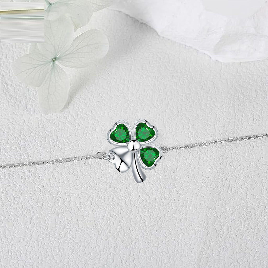 A Set Of Four-leaf Clover Bracelets And Earrings