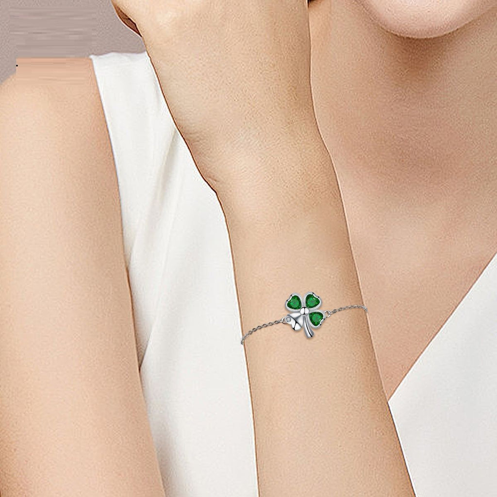 A Set Of Four-leaf Clover Bracelets And Earrings